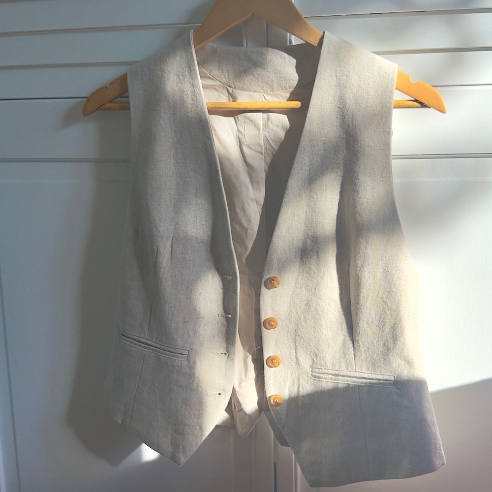 Stylish Beige Vest with Wooden Buttons